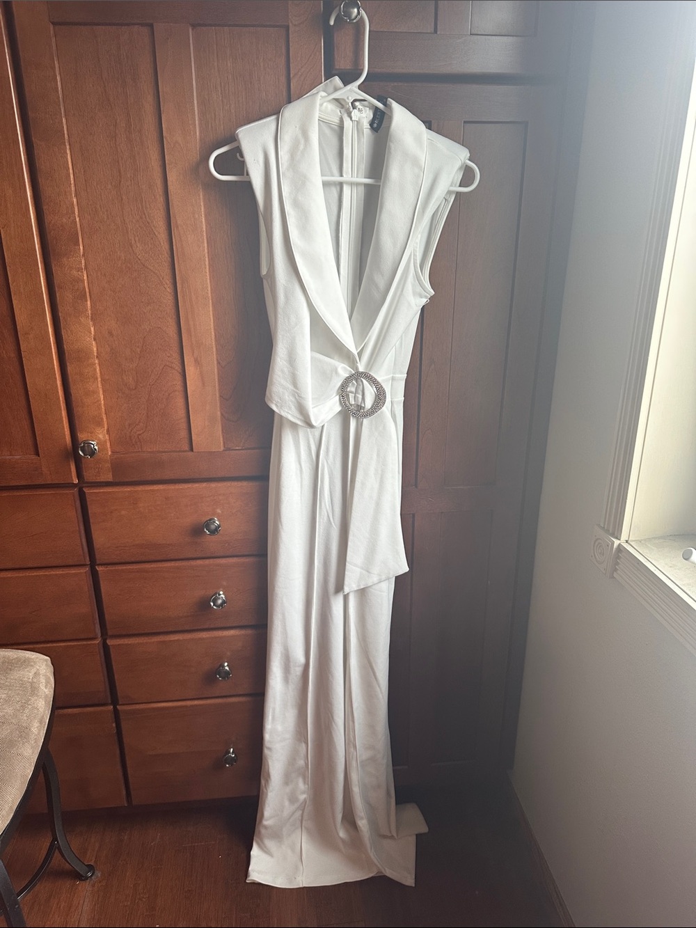 Elegant White Sleeveless Jumpsuit with Draped Belt